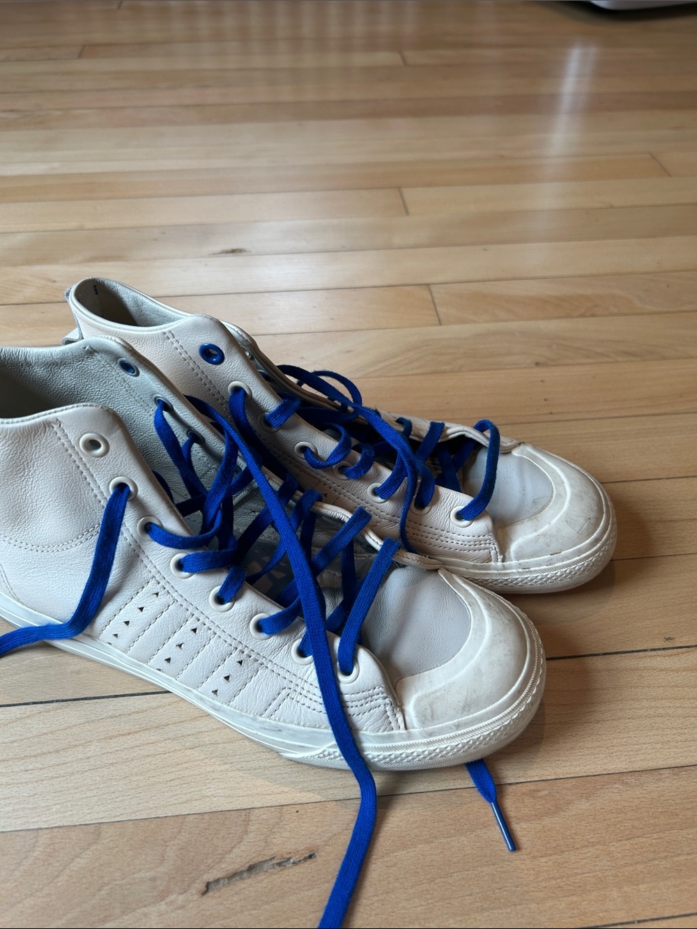 adidas human race White High-Top Sneakers